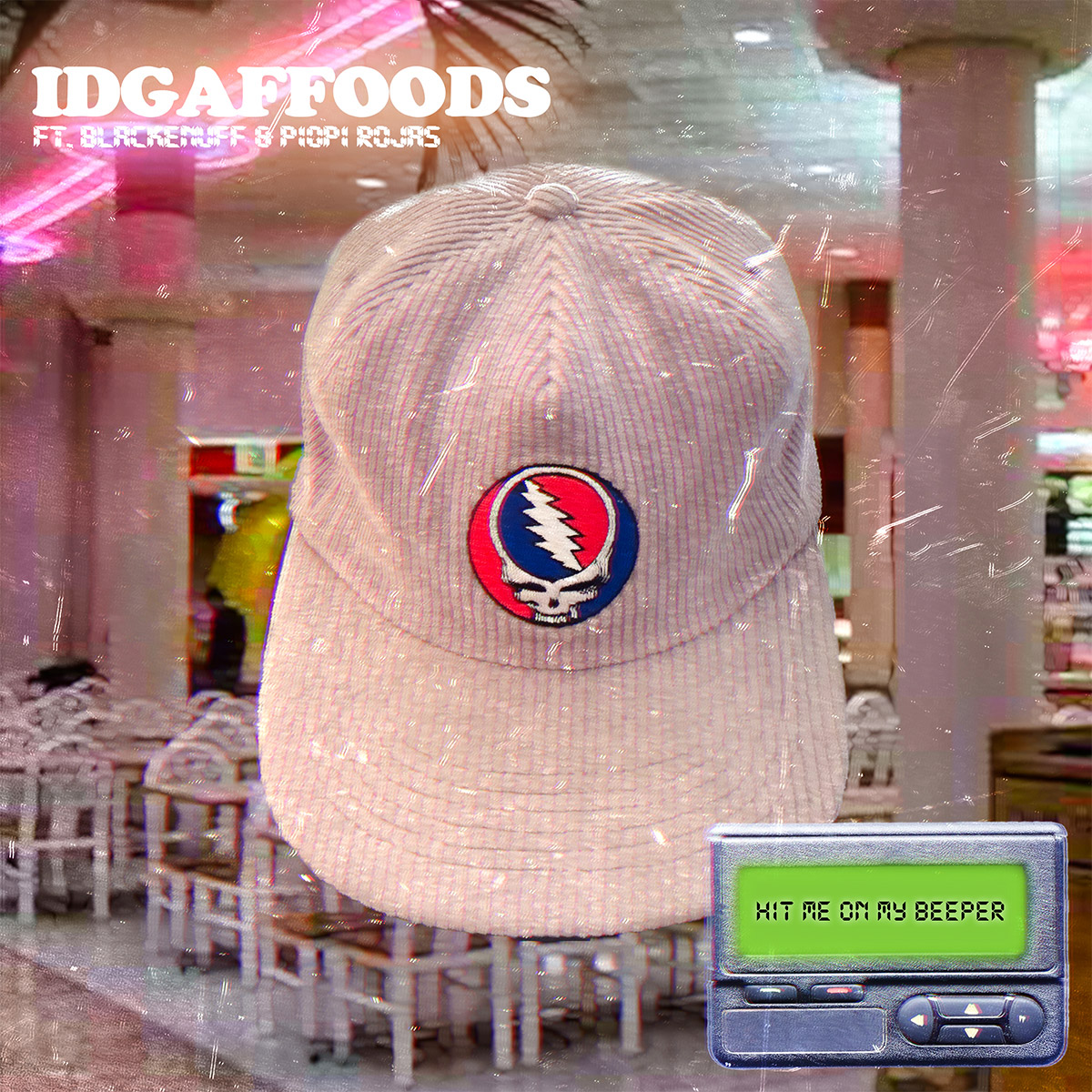 a cover art image of idgaffoods' iconic stealie hat overlayed onto a food court in a 90s style mall setting